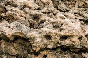surface of the stone a hole with brown tint photo