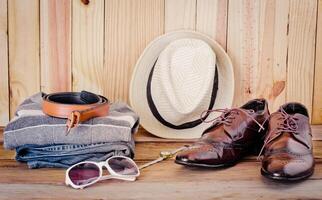 Travel accessories. Shirts, jeans, hats,shoes,bag, Belt,sunglasses,  ready for the trip photo