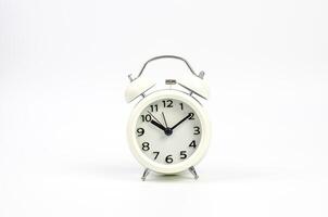 Alarm clock on a white background. photo