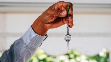 House keys close view. Buying a house background. Real estate concept photo