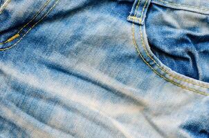 arrugas azul pantalones textura. pantalones antecedentes. foto