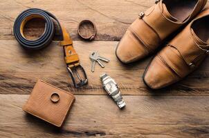 accessories for men on the wooden floor photo