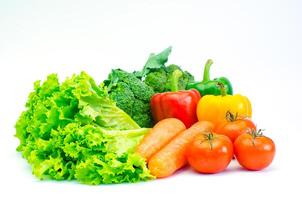 Colorful variety of vegetables for a healthy diet on a white background photo