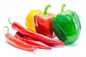 Colorful peppers on a white background. photo