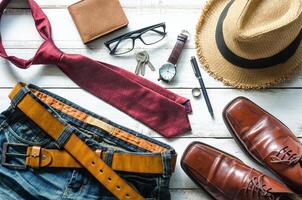 Clothing and accessories for Men on the wooden floor photo