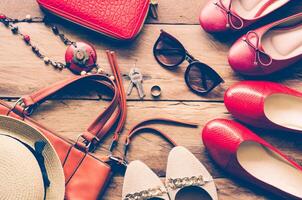 clothing for women, placed on a wooden floor. photo