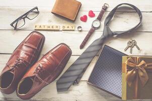 Father's Day Gift and word Father day on wooden floor - Ideas for Dad photo
