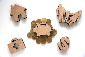 Piggy Bank Icon Set on Stack of Coins and Icon Family, Home, Dollar, Health Care - Concept of Saving Money for Daily and Future Spending photo