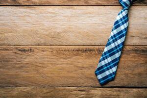 Father's Day Gift Ideas - Neckties and gift boxes are placed on wooden floor. photo