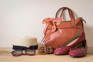 clothing for women, placed on a wooden floor. photo