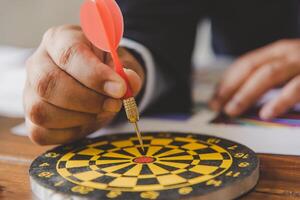 Handles the arrows to pin down the target. - The concept of business goals. photo