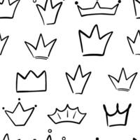 Seamless pattern with different crowns and tiaras doodles. Hand drawn crown on white. Vector funny background