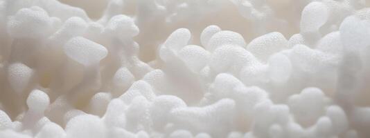 AI generated Macro shot of white foam texture. photo