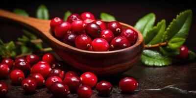 AI generated Cranberries in spoon on wooden table. photo