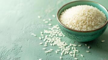 AI generated Bowl of uncooked white rice on a textured green background. Concept of culinary staple, raw rice presentation, healthy food ingredient. Banner with copy space. photo