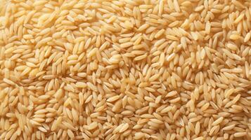 AI generated A dense, full frame of golden rice grains, rich in detail and color. Top view. Background. Texture. Concept of uncooked food, dietary staple, cereal grain, and agricultural product. photo