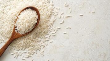 AI generated Uncooked white rice in wooden spoon on white textured background. Top view. Banner with copy space. Concept of cooking ingredient, healthy nutrition, cereal grain, and agricultural photo