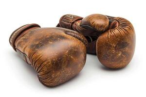 AI generated Pair of brown boxing gloves isolated on white background. Concept of boxing equipment, combat sports gear, training accessory, and worn athletic items photo