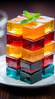 AI generated Colorful jelly cubes with mint leaf on a plate. Sweet fruit dessert. Ideal for Menu visuals, food blogging, dessert advertising, culinary arts. Vertical format. photo