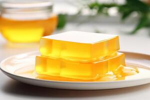 AI generated Yellow jelly on light blurred background. Sweet fruit dessert. For use in food blogs, catering services, recipe books, dessert menus photo