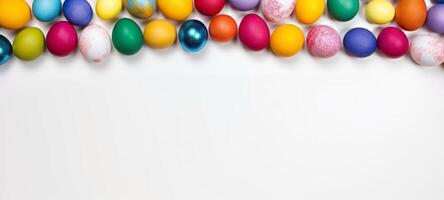 AI generated Top view of multicolored Easter eggs creating a border on a white background, leaving ample copy space. Perfect for festive social media content, print advertisements. Banner. photo