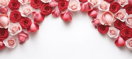 AI generated A border of red and pink roses on a white background, with scattered petals. Banner with Copy space. Ideal for Valentines Day, anniversaries, or romantic occasions photo