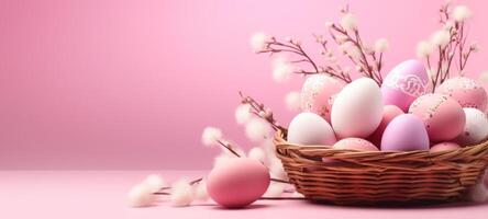 AI generated Pink Easter eggs in basket, with delicate patterns, accompanied by fluffy pussy willows on soft pink surface. Banner with copy space. Ideal for festive Easter marketing photo