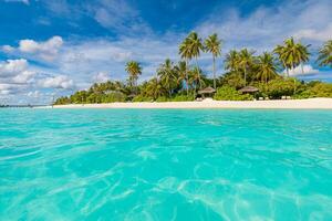 Beautiful, relaxing outdoor landscape of tropical island beach. Palm trees over blue azure ocean lagoon. Exotic traveling destination, summer vacation, beach seaside. Colorful nature sea sand sky view photo