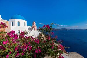 Beautiful panoramic view on the mediterranean blue sea, caldera and volcano. Traditional white architecture of Santorini island, Thira, Greece. Urban idyllic street view, Oia stairs photo