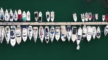 Top view of boats in Procida, Italy, the most popular tourist attractions on the beach. Action. Yacht parking, yacht and sailboat is moored at the quay video