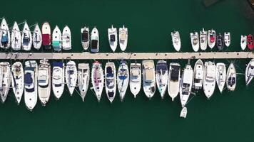 Top view of boats in Procida, Italy, the most popular tourist attractions on the beach. Action. Yacht parking, yacht and sailboat is moored at the quay video