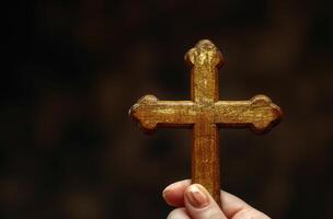 AI generated Female hand holds wooden cross, palm crosses image photo
