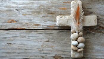 AI generated Stone cross with feather and pebbles on wood backdrop, palm sunday greetings concept photo