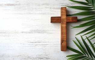 AI generated Wooden cross and palm leaf on white table, palm crosses image photo