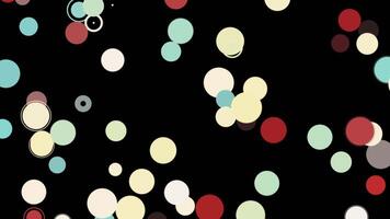 Beautiful abstract animation of multicolored circles appearing and disappearing on the black background. Animation. Abstract 3d render of transition with geometric shapes video