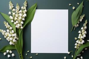 AI generated mockup white blank paper sheet with lilies of the valley flowers top view on dark green background, floral template empty card flat lay for design with copy space photo