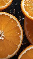 AI generated orange slices with water drops on them photo