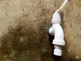 A photo of a white water tap. Perfect for magazines, newspapers, tabloids