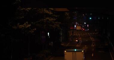 A night traffic jam at the city street in Tokyo telephoto shot video