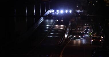 A night traffic jam at the city street in Tokyo telephoto shot video