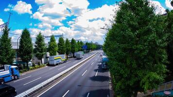 A timelapse of traffic jam at the downtown street in Tokyo fish eye shot zoom video