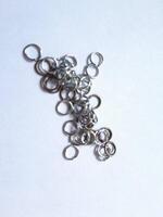 Photos of lots of small iron rings. This photo is perfect for calendars, advertisements, banners, posters