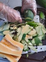 A photo of a papaya being peeled. Perfect for newspapers, magazines and tabloids