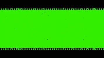 Old cinema negative film strip motion vertical horizontal green screen keylight video