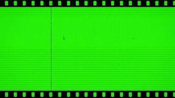 Old cinema negative film strip motion vertical horizontal green screen keylight video