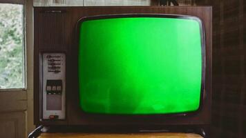 alt Nostalgie Fernsehen oder Fernseher zeigen Film und Video Grün Bildschirm