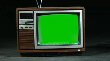 alt Nostalgie Fernsehen oder Fernseher zeigen Film und Video Grün Bildschirm