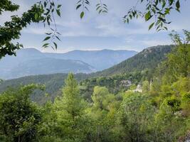 majestic view of the mountains from a hill photo