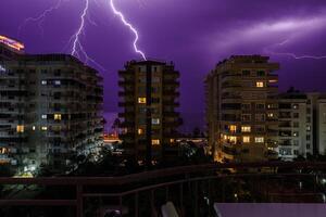 Lightning strike on the sea at night photo