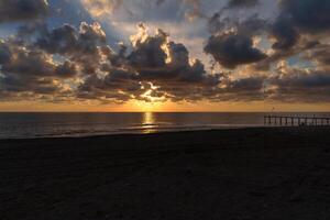 Sunset at a beach photo